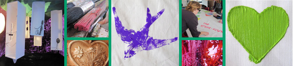 Banner showing symbols of human resilience through creative and research practice including hand printed green heart and purple bird, lantern modelling and banner-making