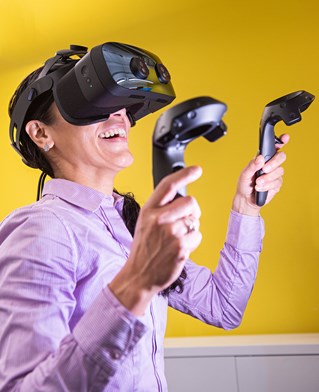 Researcher working with a Virtual Reality headset