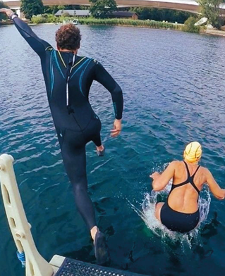 Two people leaping into open water research and photograph by Sadie Rockliffe