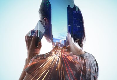 Image of a woman overlaid with a photograph of traffic