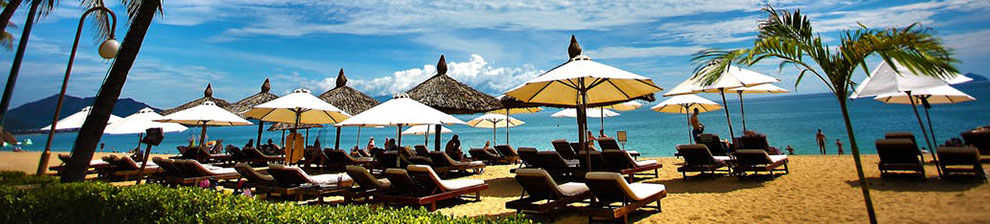 tourism phd topics Image representing the study of tourism at PhD level shows an exotic beach scene crowded with sunbeds and parasols raising questions of sustainable and ethical tourism