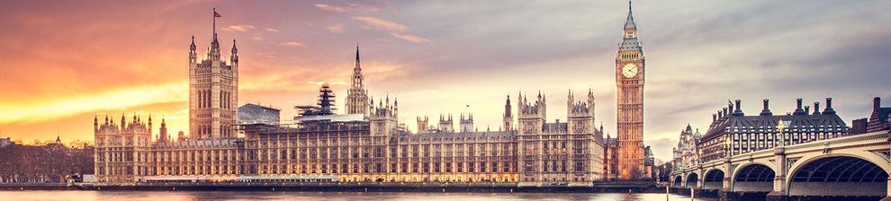 Banner representing politics PhD research shows a stylised image of the Houses of Parliament, London, and Westminster bridge against a setting sun.