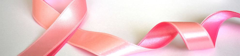 A pink ribbon, looped in the shape for the iconographic support symbol for breast cancer sufferers.