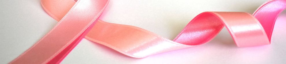 A pink ribbon, looped in the shape for the iconographic support symbol for breast cancer sufferers.