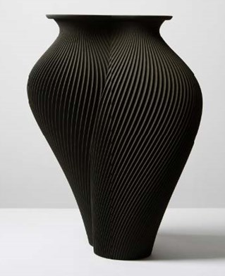 Black vase with fluted edges in twisting shape. Gareth Neal's sand printed vase Twisted Pair.
