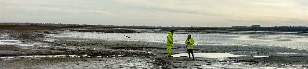 Civil engineers assessing flood areas