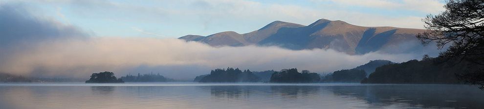 Mist over a river and mountains