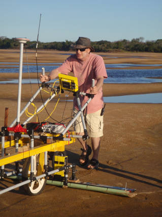 Professor Phil Ashworth using ground penetrating radar for flood research