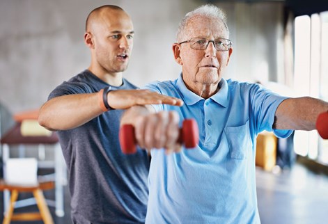 an elderly man doing exercises