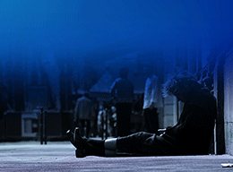 Image of person lying down depressed