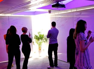 People in a white room