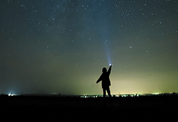 Image of someone looking at the night sky