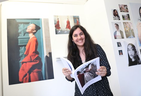 Fashion student looking at a magazine