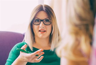 Counsellor working with a client