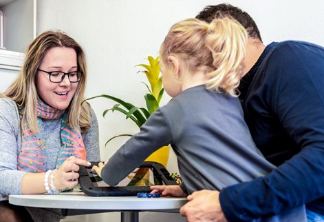 A family using a tablet