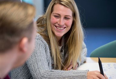 Smiling student in a seminar