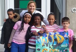 Student on a volunteering project with children