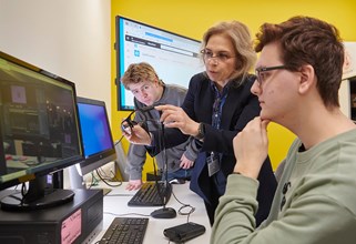 Students looking at smart glasses
