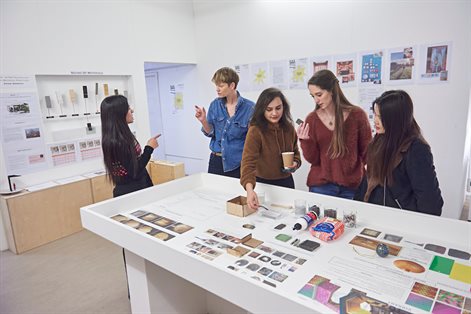Four female students presenting Interior Design work