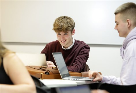 male marketing student smiling