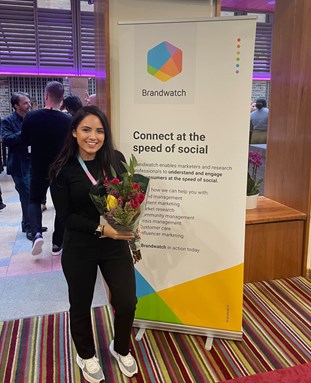 MJ with flowers at an event