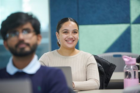 Student smiling in a seminar