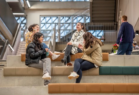 Students on steps by Elm House cafe