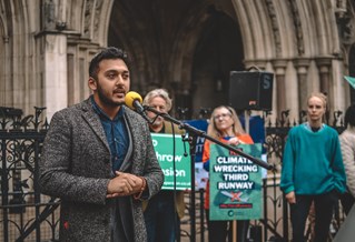 Brighton Law School lecturer speaking at a protest