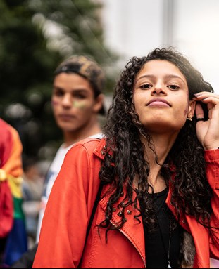 female student with friends at festival