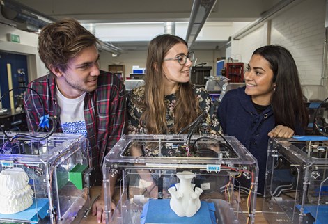 Students using 3D printers