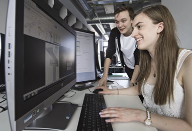 Students on computer working 