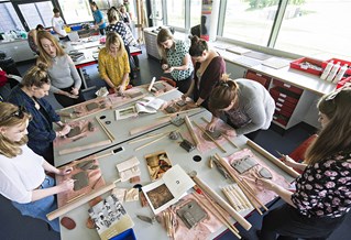 Art and Design students in a workshop