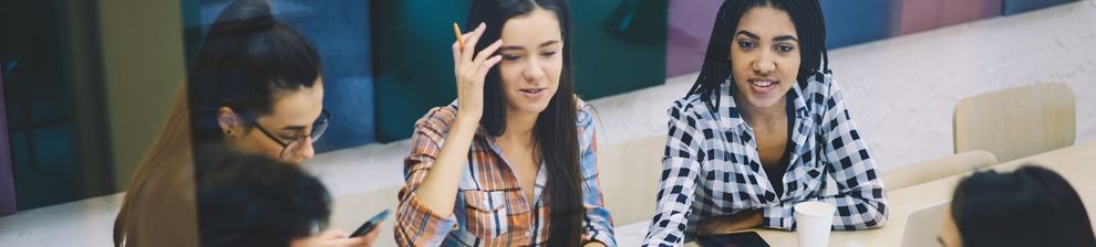 mature students working around table