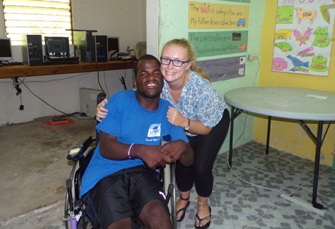 Hayleigh Ponting with a student in a wheelchair