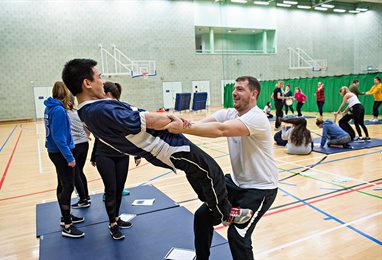 Students in the sports hall exercising