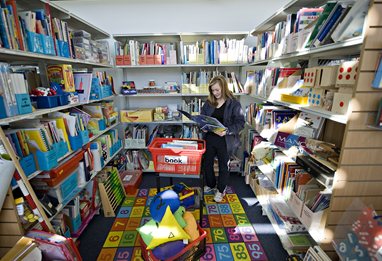 Primary education student in early years library