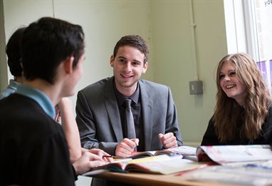 Students chatting in a classroom