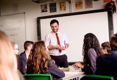 Primary school teacher and pupils