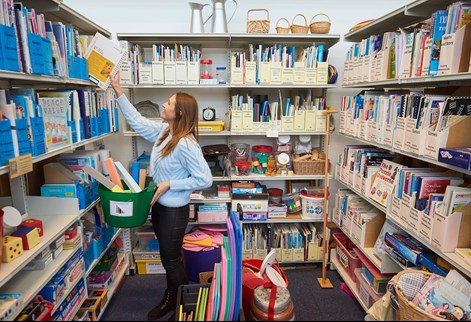 Education student looking at curriculum centre resources