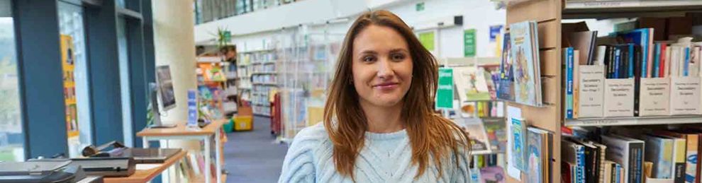 Education student walking through curriculum centre
