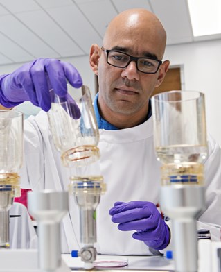 Microbiologist undertaking lab research 
