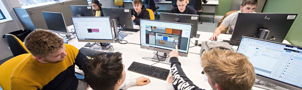 Group of students in computer lab using BIM