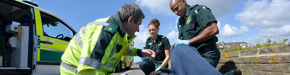 Paramedics around a patient