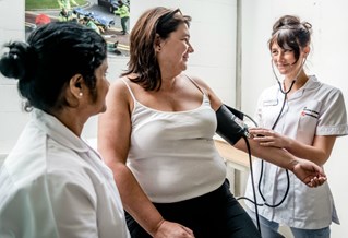 Health Apprenticeship students working with a patient