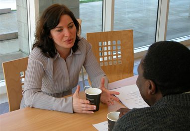 Students discussing their work