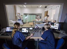 Nursing students being observed by staff