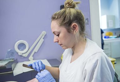 Podiatry Student working on a foot