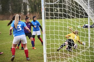 Women's football team in action