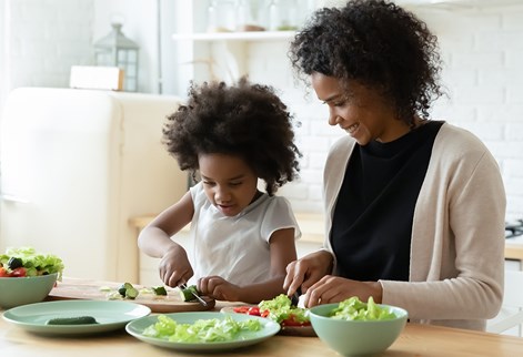 mum and daughter cooking