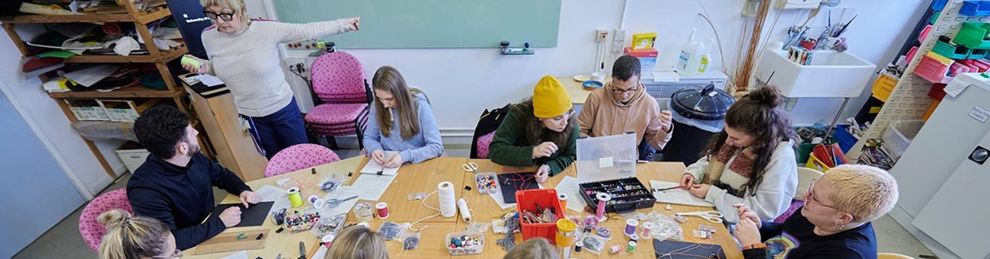 group of students round the craft table